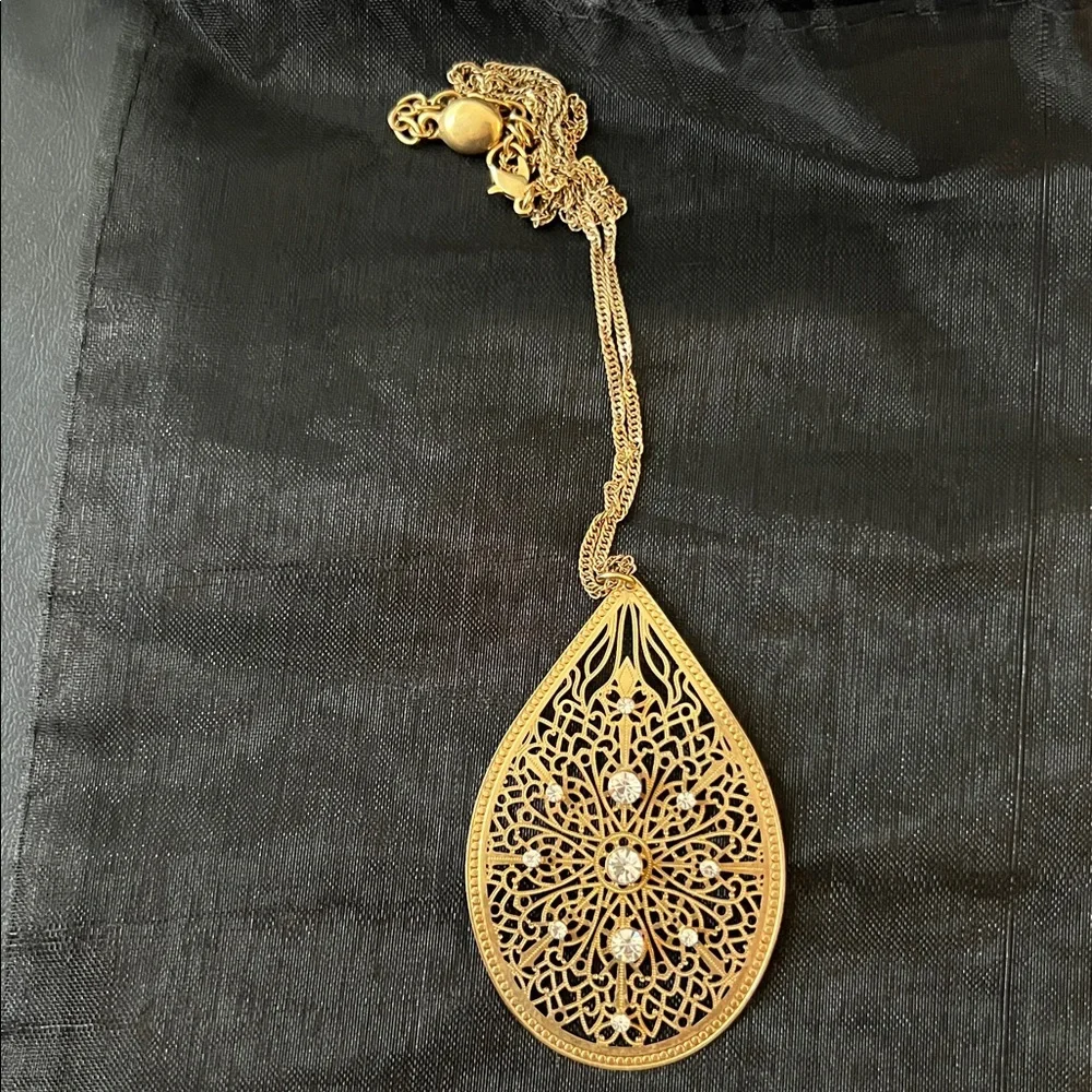 NECKLACE of GOLD TONE FILIGREE WITH RHINESTONES A TWISTED CHAIN AND EXTENSION
